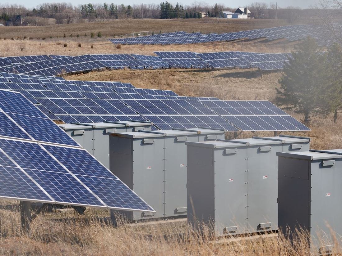 Steel beams and module clamps of a ground-mounted array, the upper part of a solar ground mount foundation system
